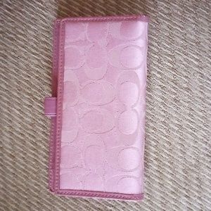 Coach pink check book cover